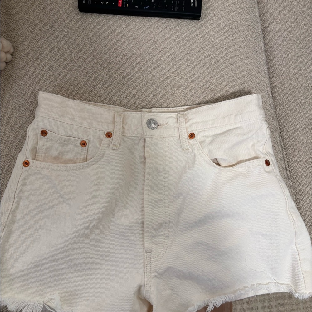 Re/Done White Denim Cutoff Shorts with Frayed Hem